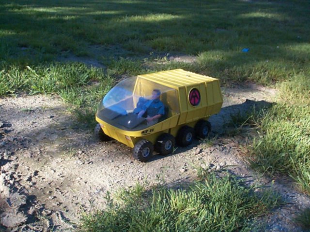 This is my first photo story. It was inspired by Wes Wood, who sent me a Top Cop figure, wrapped, mummy-like, in paper towels, in a box.